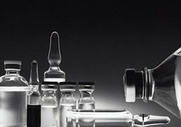 national-cancer-institute_glass-vials_unsplash-landscape-New